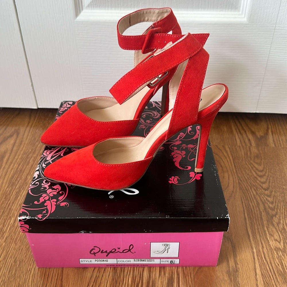 Red strap pumps
